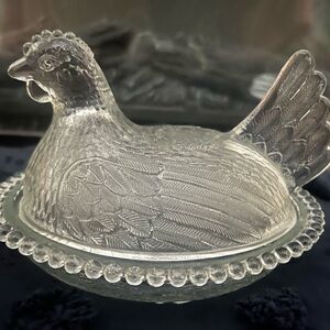 Indiana hand on a nest Glass Hen Covered Dish